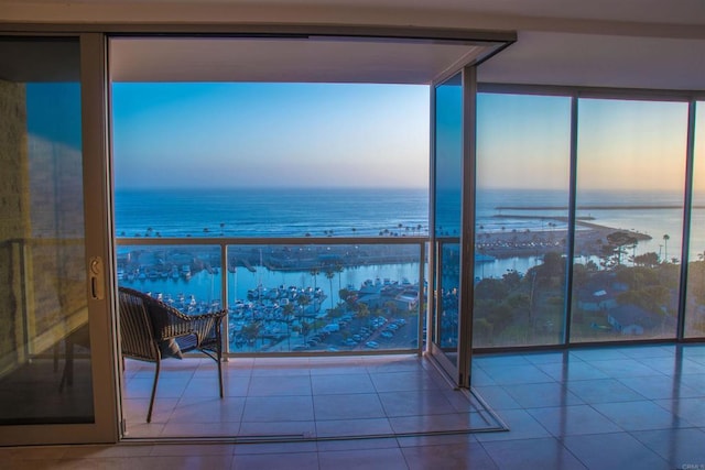 1200 N Harbor Dr Unit 15B, Oceanside, CA 92054 - balcony at dusk with a water view