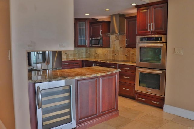 1200 N Harbor Dr Unit 15B, Oceanside, CA 92054 - kitchen featuring beverage cooler, stainless steel appliances, wall chimney exhaust hood, dark brown cabinets, and decorative backsplash
