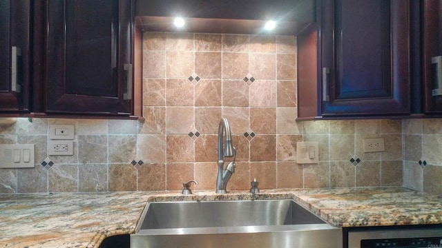 1200 N Harbor Dr Unit 15B, Oceanside, CA 92054 - kitchen with light stone counters and tasteful backsplash