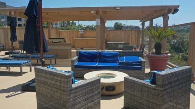 1200 N Harbor Dr Unit 15B, Oceanside, CA 92054 - view of patio featuring an outdoor living space with a fire pit
