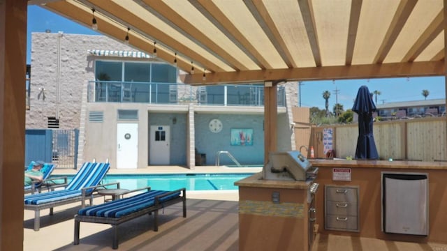 1200 N Harbor Dr Unit 15B, Oceanside, CA 92054 - view of patio / terrace featuring a community pool and area for grilling