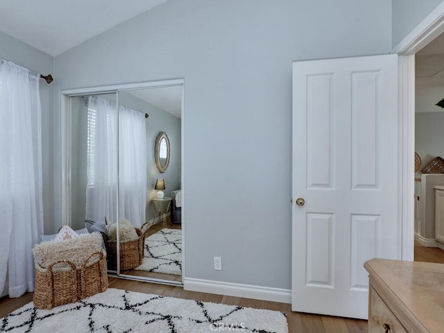 28 Covington, Mission Viejo, CA 92692 - bedroom featuring vaulted ceiling, wood finished floors, and a closet