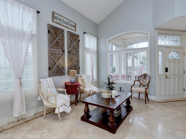 28 Covington, Mission Viejo, CA 92692 - living room with baseboards and high vaulted ceiling