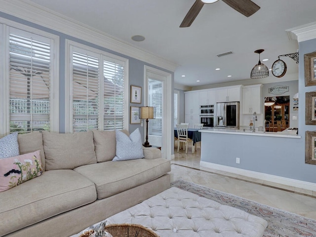 28 Covington, Mission Viejo, CA 92692 - living area with ornamental molding, a ceiling fan, recessed lighting, inlaid floor details, and light tile patterned flooring