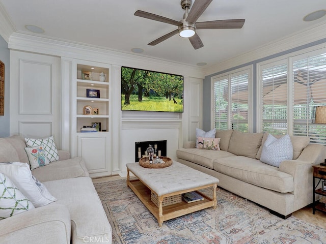 28 Covington, Mission Viejo, CA 92692 - living room featuring ceiling fan, crown molding, and built in features