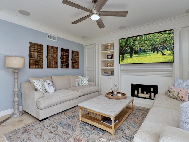 28 Covington, Mission Viejo, CA 92692 - living area with built in shelves, ceiling fan, and ornamental molding