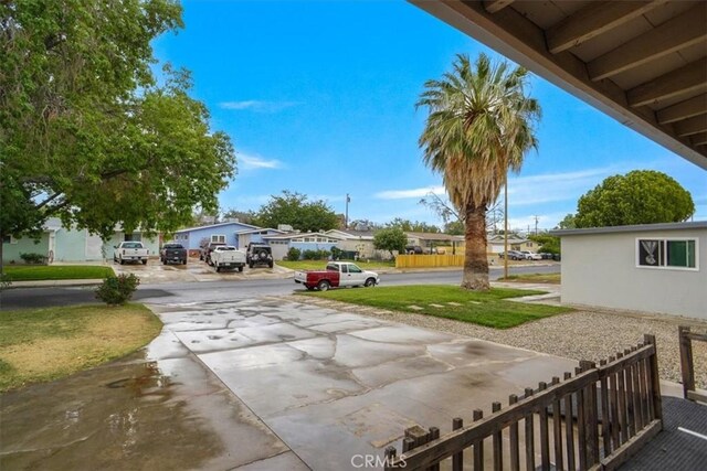 44037 Heaton Ave, Lancaster, CA 93534 - view of yard featuring a residential view and driveway