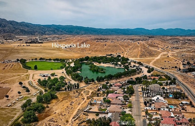 7912 Royce Ave, Hesperia, CA 92345 - aerial view of sparsely populated area featuring a mountainous background