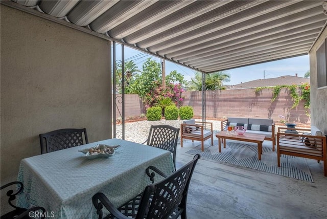 1139 W 149th St, Gardena, CA 90247 - fenced backyard with an outdoor hangout area, a patio area, and outdoor dining space