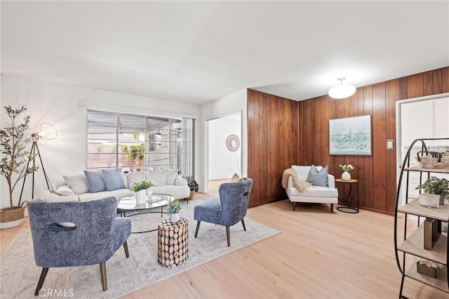 1139 W 149th St, Gardena, CA 90247 - living area featuring light wood-style flooring and wooden walls