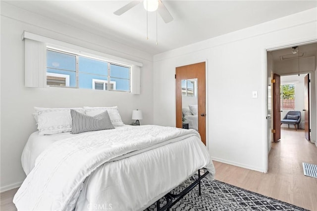 1139 W 149th St, Gardena, CA 90247 - bedroom featuring attic access, wood finished floors, multiple windows, and baseboards