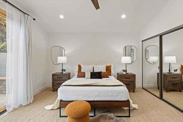 3995 Cypress Del Mar, San Diego, CA 92130 - bedroom featuring light colored carpet, baseboards, recessed lighting, a closet, and a ceiling fan