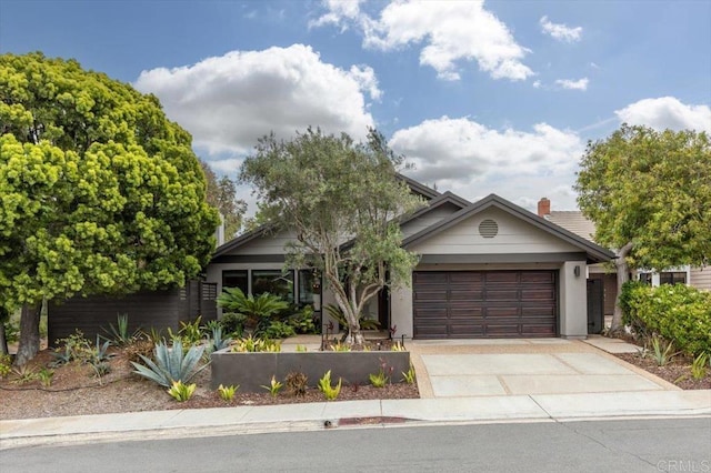 3995 Cypress Del Mar, San Diego, CA 92130 - view of front of property featuring driveway and an attached garage