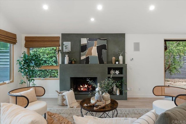 3995 Cypress Del Mar, San Diego, CA 92130 - living area featuring recessed lighting, wood finished floors, a fireplace, and baseboards
