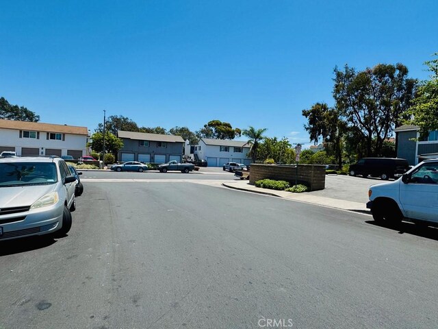 24871 Sherwood Way, Dana Point, CA 92629 - view of asphalt street featuring a residential view, curbs, and sidewalks