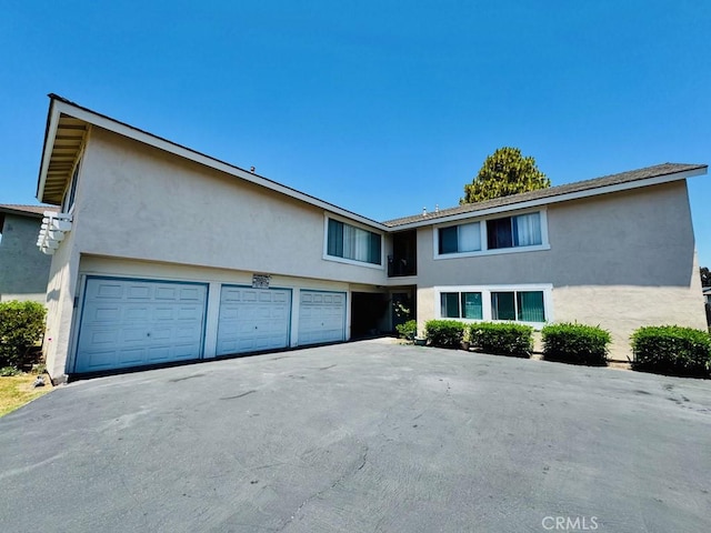 24871 Sherwood Way, Dana Point, CA 92629 - multi unit property with stucco siding, driveway, and a garage
