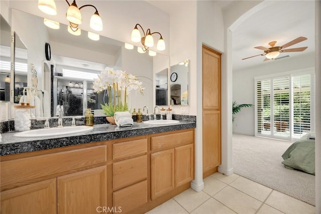 23820 Towish Dr, Corona, CA 92883 - full bathroom featuring tile patterned floors, double vanity, a ceiling fan, and ensuite bath