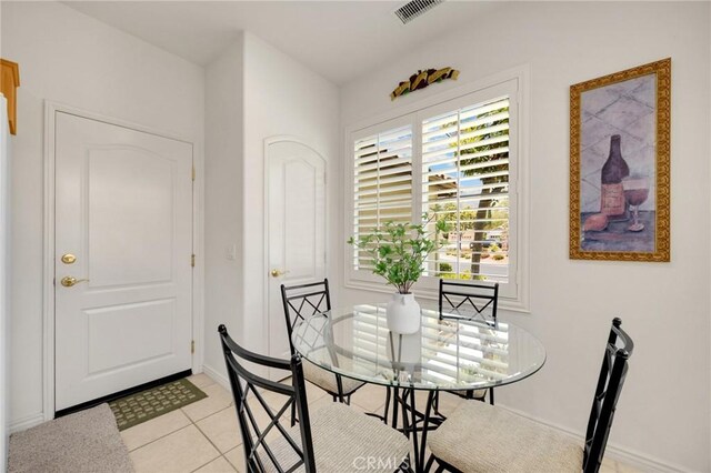23820 Towish Dr, Corona, CA 92883 - dining space with light tile patterned floors and baseboards