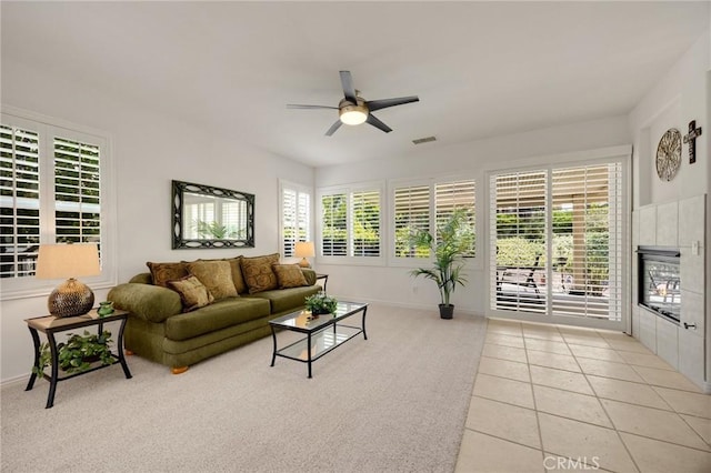 23820 Towish Dr, Corona, CA 92883 - living area featuring a ceiling fan, light carpet, and light tile patterned flooring