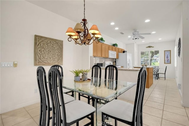 23820 Towish Dr, Corona, CA 92883 - dining area featuring light tile patterned flooring, recessed lighting, baseboards, a chandelier, and ceiling fan