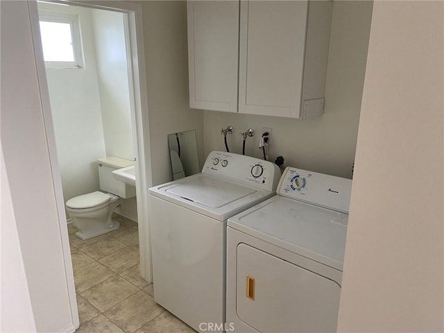 737 Carnelian St, Redondo Beach, CA 90277 - washroom featuring separate washer and dryer, cabinet space, and light tile patterned floors