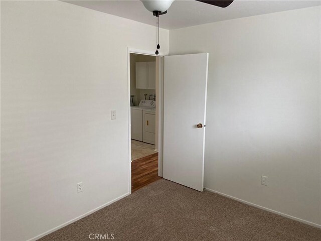 737 Carnelian St, Redondo Beach, CA 90277 - carpeted empty room with washing machine and clothes dryer, a ceiling fan, and baseboards