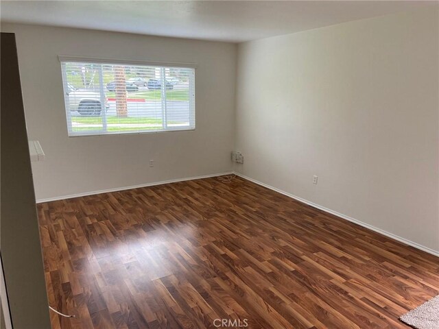 737 Carnelian St, Redondo Beach, CA 90277 - unfurnished room with dark wood-type flooring and baseboards