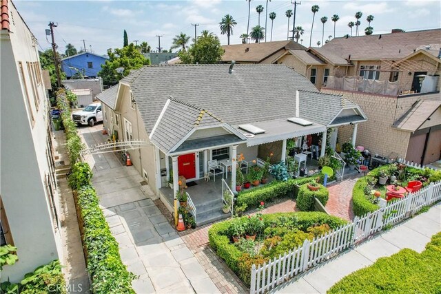 2756 W 15th St, Los Angeles, CA 90006 - view of front of home featuring a shingled roof and a residential view