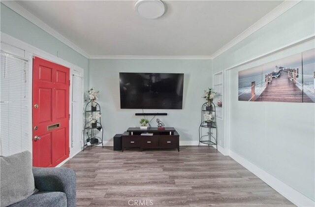 2756 W 15th St, Los Angeles, CA 90006 - living area featuring wood finished floors, crown molding, and baseboards