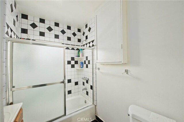 2756 W 15th St, Los Angeles, CA 90006 - full bathroom with toilet, enclosed tub / shower combo, and vanity