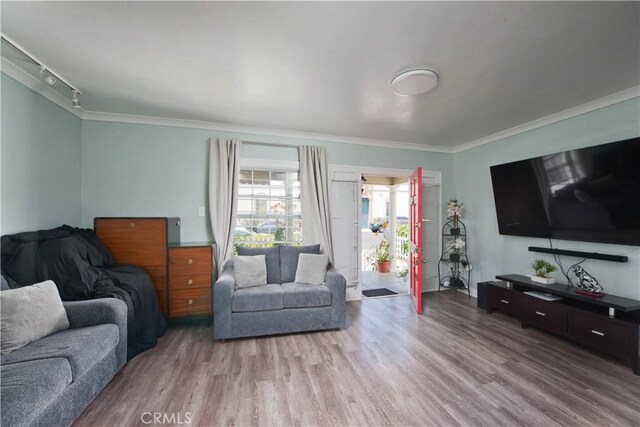 2756 W 15th St, Los Angeles, CA 90006 - living room featuring crown molding, wood finished floors, and rail lighting