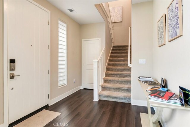 20623 Peaceful Woods Dr, Diamond Bar, CA 91789 - foyer featuring dark wood-style floors, stairs, and baseboards