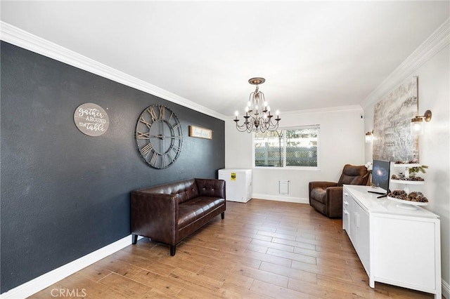 41480 Luz Del Sol, Temecula, CA 92591 - sitting room featuring crown molding, a chandelier, light wood finished floors, and baseboards