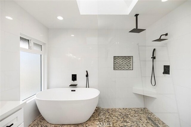 41480 Luz Del Sol, Temecula, CA 92591 - full bathroom with a freestanding tub, a walk in shower, vanity, and recessed lighting