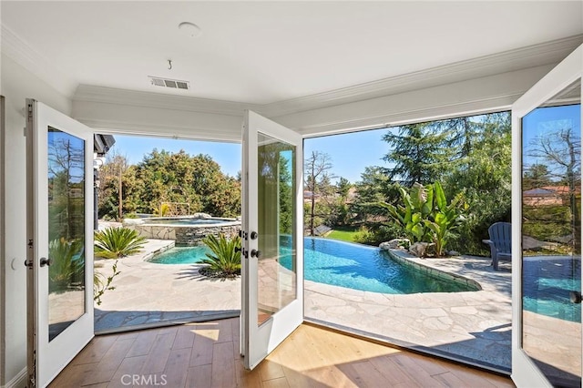 41480 Luz Del Sol, Temecula, CA 92591 - doorway to outside featuring french doors, ornamental molding, and wood-type flooring