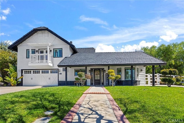 41480 Luz Del Sol, Temecula, CA 92591 - view of front of house with a garage, a front lawn, concrete driveway, a balcony, and covered porch