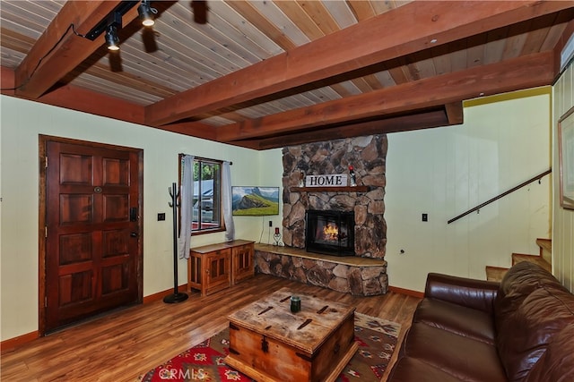320 W Aeroplane Blvd, Big Bear City, CA 92314 - living area with baseboards, wood finished floors, stairs, and wood ceiling with exposed beams