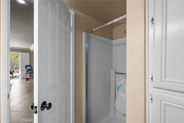 2330 Sycamore Ln, Palmdale, CA 93551 - full bath with a shower stall and tile patterned flooring