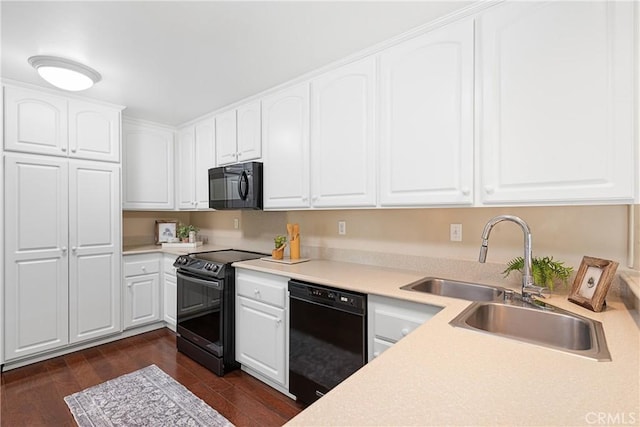 12670 Oxford Dr, La Mirada, CA 90638 - kitchen featuring black appliances, a sink, dark wood-type flooring, and white cabinets
