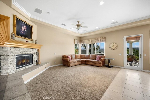 20130 Thagard Way, Yorba Linda, CA 92887 - living room featuring crown molding, a ceiling fan, a stone fireplace, light carpet, and light tile patterned floors