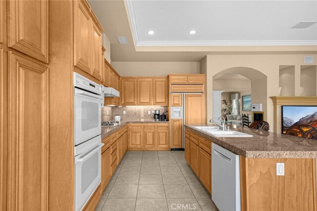 20130 Thagard Way, Yorba Linda, CA 92887 - kitchen with dishwashing machine, paneled refrigerator, a sink, white double oven, and arched walkways