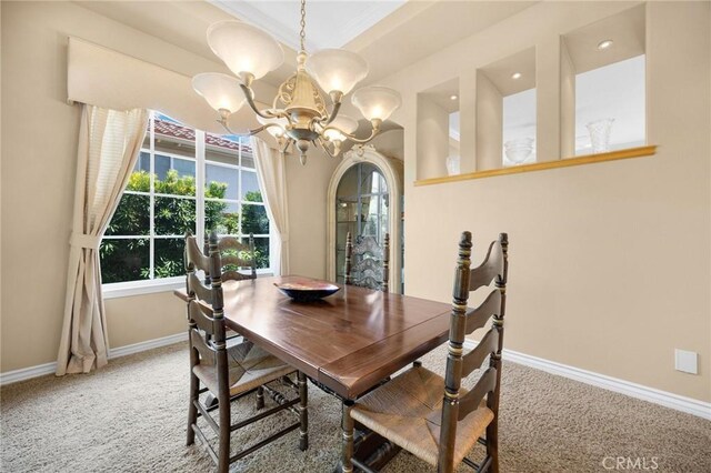 20130 Thagard Way, Yorba Linda, CA 92887 - carpeted dining room featuring a chandelier, baseboards, and ornamental molding