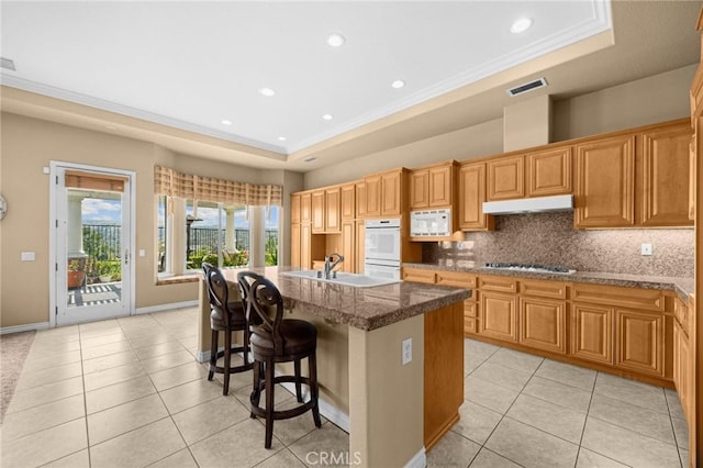 20130 Thagard Way, Yorba Linda, CA 92887 - kitchen with a raised ceiling, a sink, white appliances, light tile patterned floors, and recessed lighting