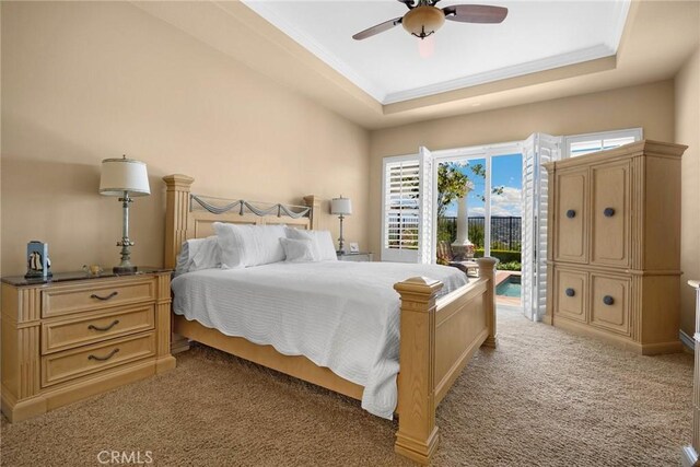 20130 Thagard Way, Yorba Linda, CA 92887 - bedroom with access to outside, light carpet, a tray ceiling, a ceiling fan, and ornamental molding