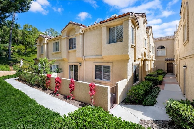 21124 Gladiolos Way, Lake Forest, CA 92630 - mediterranean / spanish-style home with stucco siding and a tiled roof