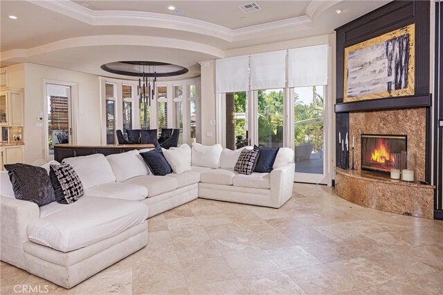 20391 Cypress St, Newport Beach, CA 92660 - living room featuring crown molding, a raised ceiling, a high end fireplace, and recessed lighting
