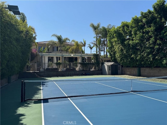 20391 Cypress St, Newport Beach, CA 92660 - view of tennis court with a storage unit