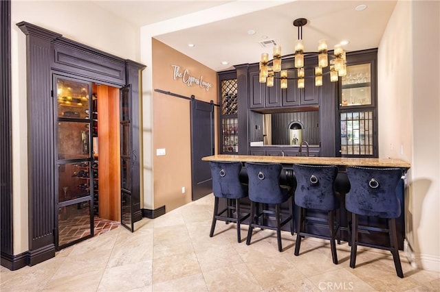 20391 Cypress St, Newport Beach, CA 92660 - bar area with a barn door, a chandelier, decorative light fixtures, recessed lighting, and light tile patterned flooring