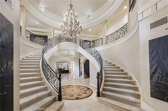 20391 Cypress St, Newport Beach, CA 92660 - entryway featuring a towering ceiling, a chandelier, arched walkways, stairway, and recessed lighting