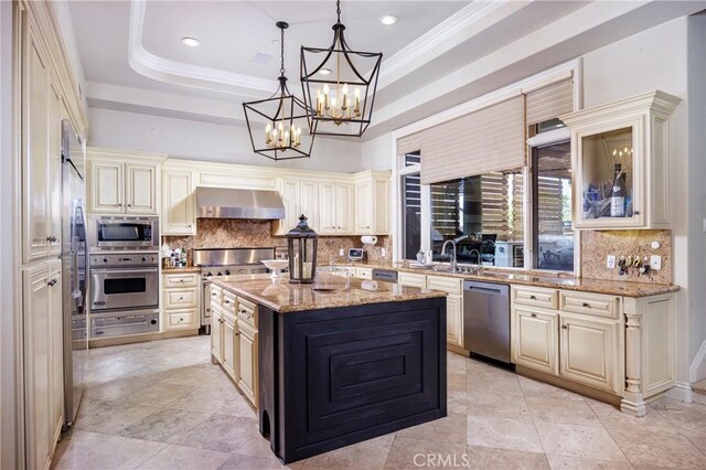 20391 Cypress St, Newport Beach, CA 92660 - kitchen featuring appliances with stainless steel finishes, cream cabinets, recessed lighting, and crown molding